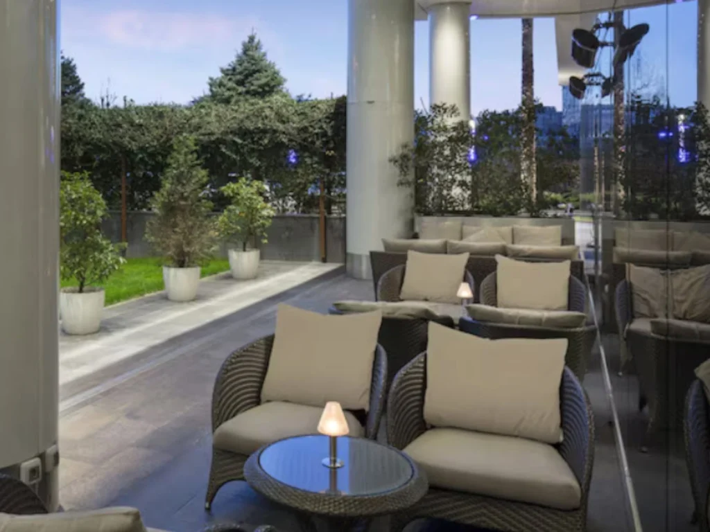 Outdoor lounge furniture on a sheltered terrace