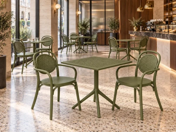 Maria armchairs with Moduline Punto table, 2-seater set in green on a restaurant terrace – Trend Concept