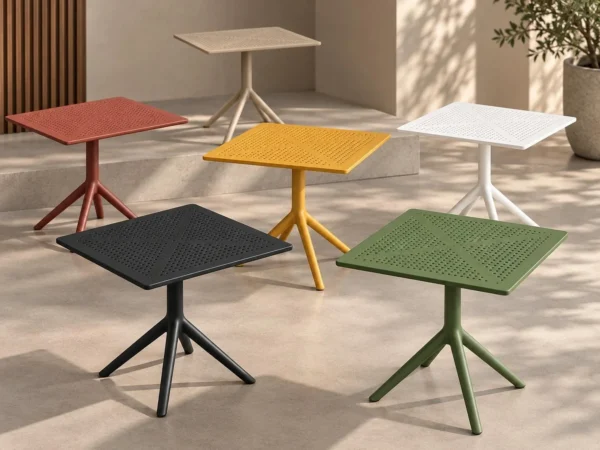 Moduline Punto resin tables in several colours on a terrace – Trend Concept